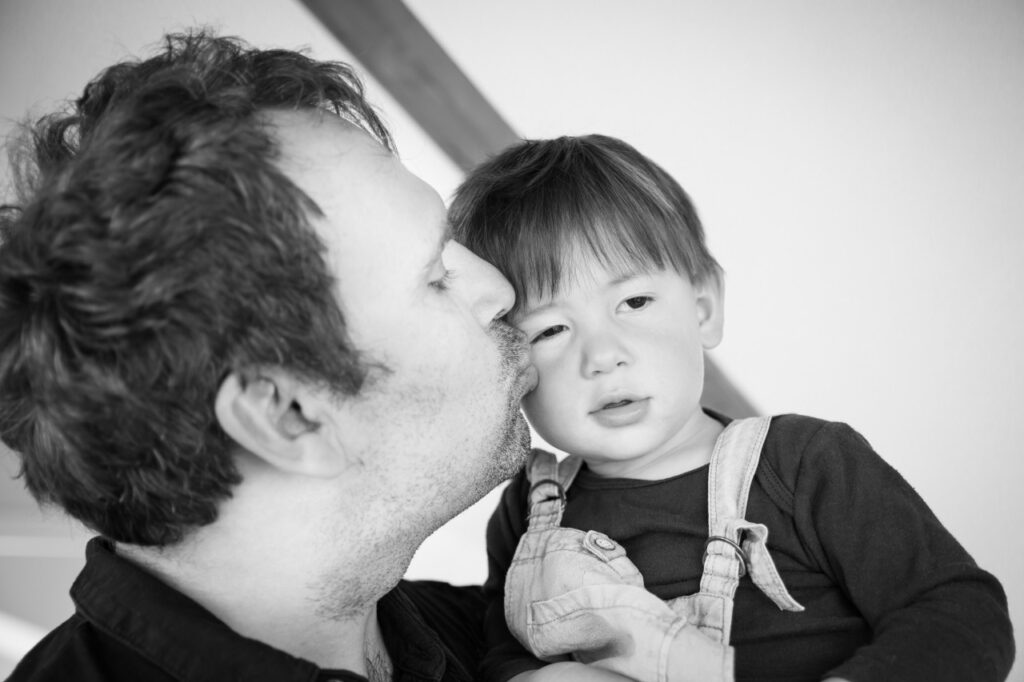 dad kissing son family home session sf bay area