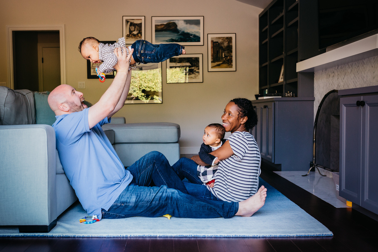 mom and dad having fun with twins family session sf bay area
