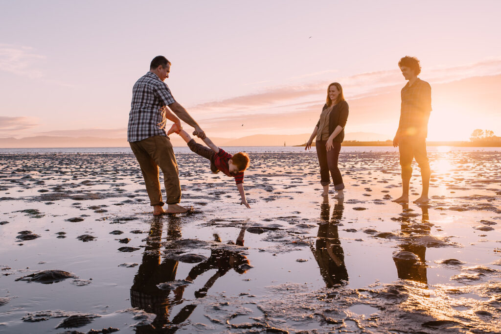san-francisco-family-photographer-carmen-dunham-photography-KP7 portrait of family connecting, having fun at low tide at crab cove beach alameda at sunset