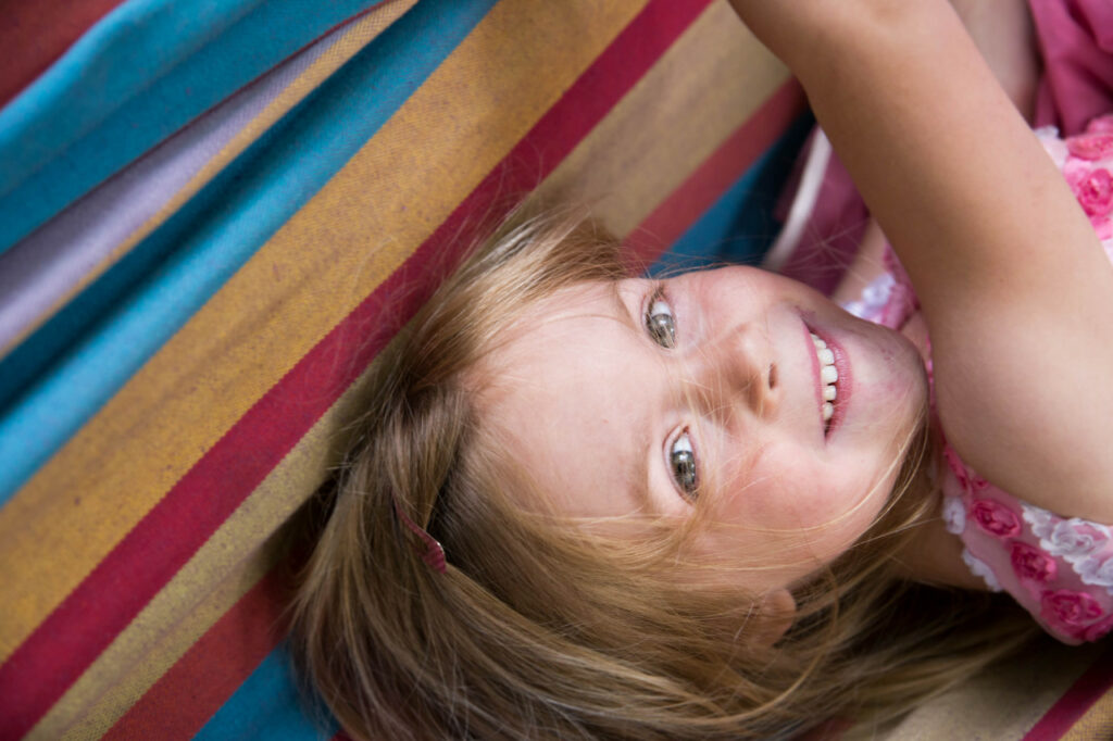 girl in hammock smiling sf bay area russian creek cazadero