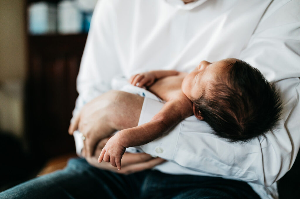 dad holding baby boy newborn session sf bay area