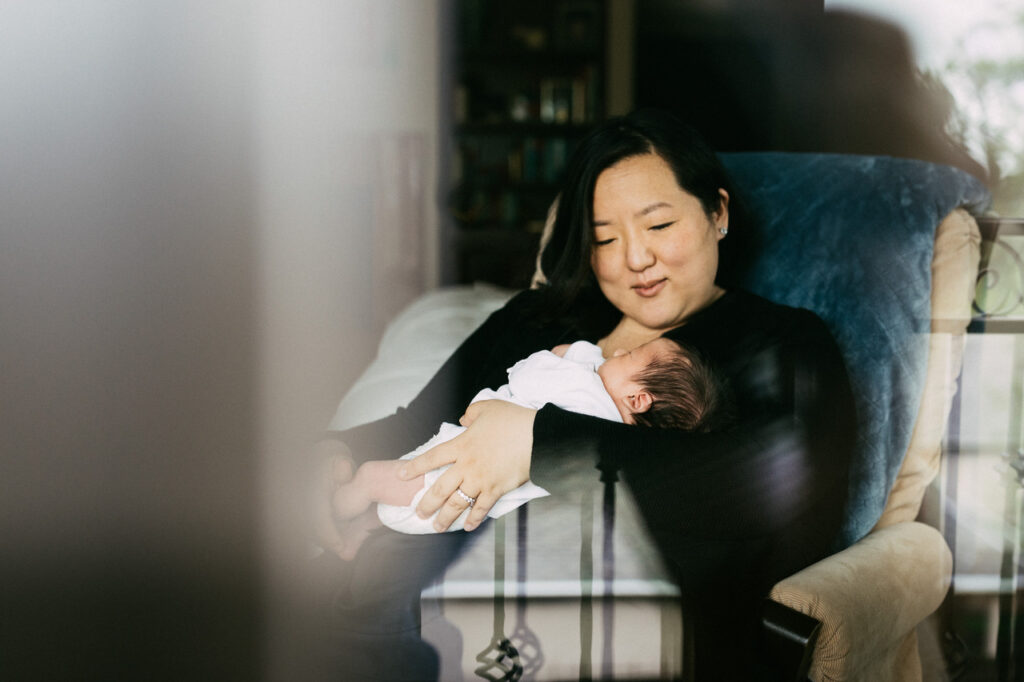 mom holding bonding baby boy newborn session sf bay area