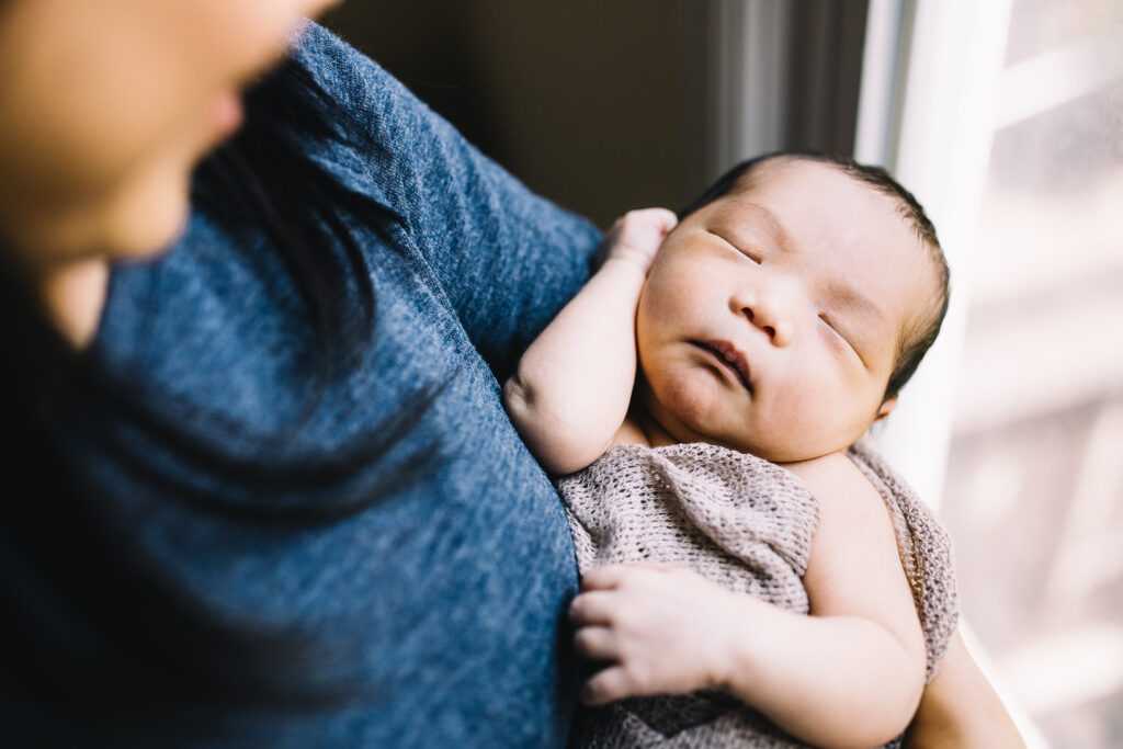 baby infant boy being held by mom newborn session sf bay area at home