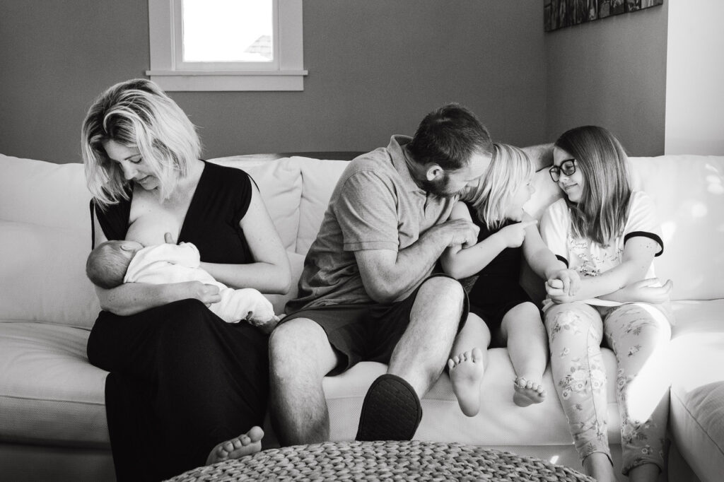 family bonding with mom breastfeeding newborn home session bay area alameda