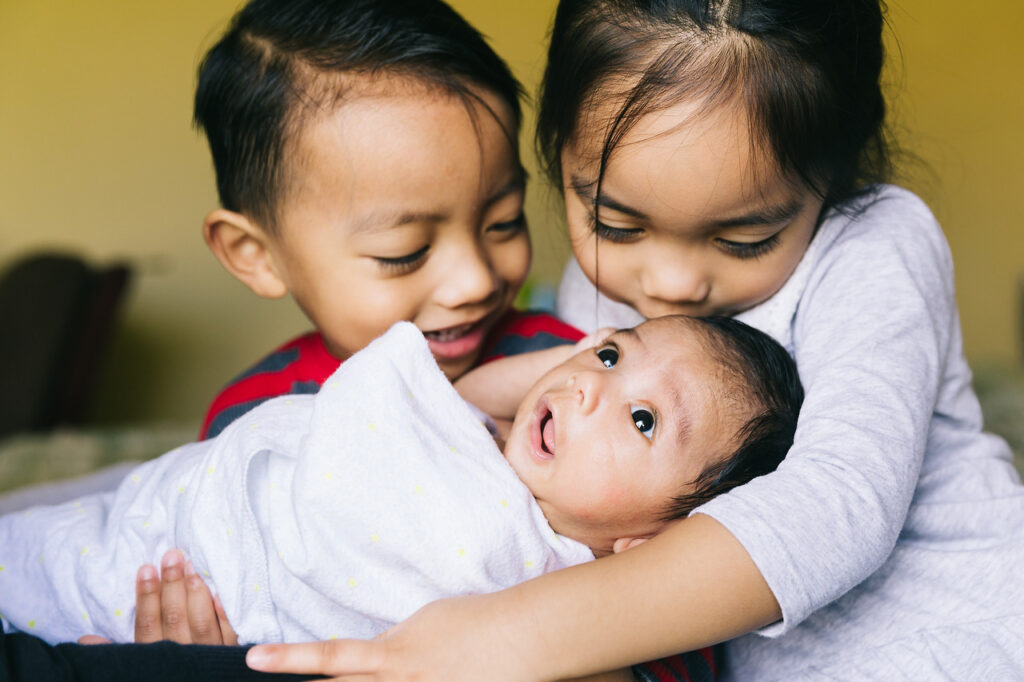 big sibling love with baby brother home newborn session sf bay area