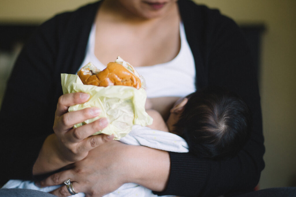 mom self care while breastfeeding baby boy home newborn session sf bay area