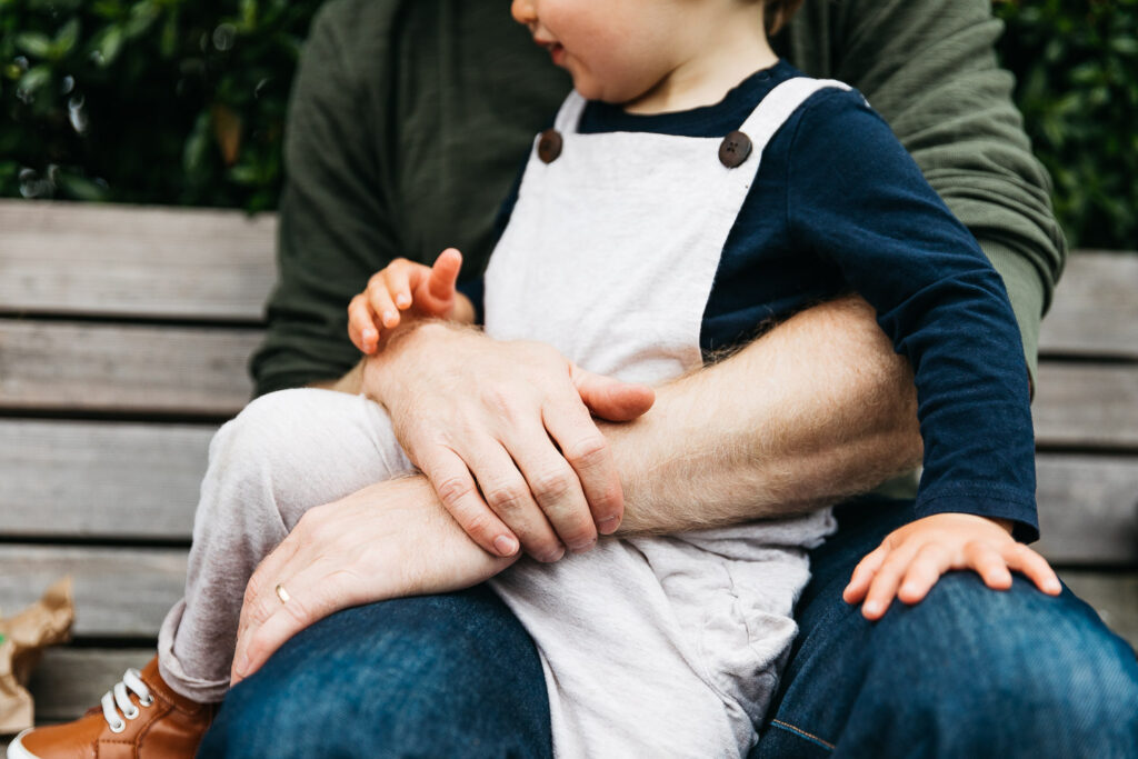 san-francisco-bay-area-family-photographer-carmen-dunham-photography-and-filmsIMG_5265 sweet moment of dad holding son in alamo square park san francisco family session