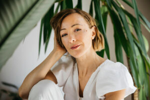 Massage therapist is smiling naturally at the camera during a creative branding session in san francisco.