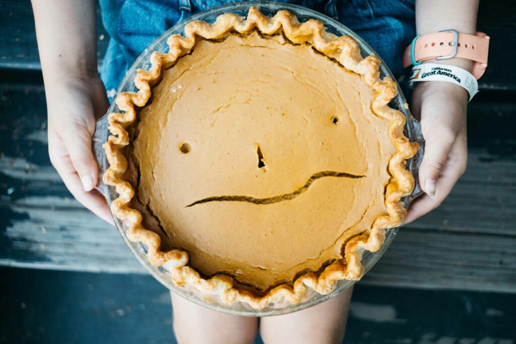 birthday pumpkin pie with funny face cracks