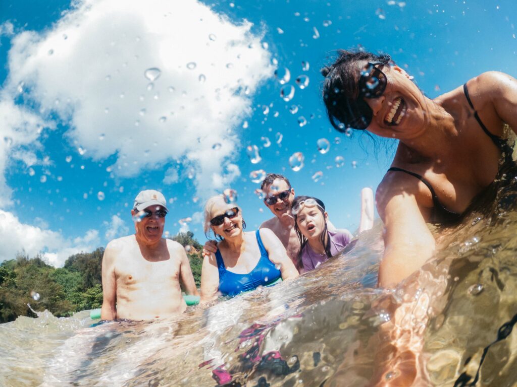 selfie photo of family having fun at anini beach in kauai