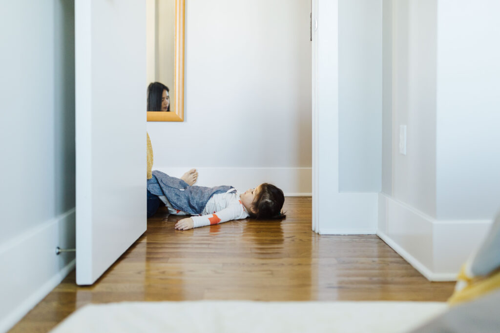 mother and daughter hanging out in the hallway