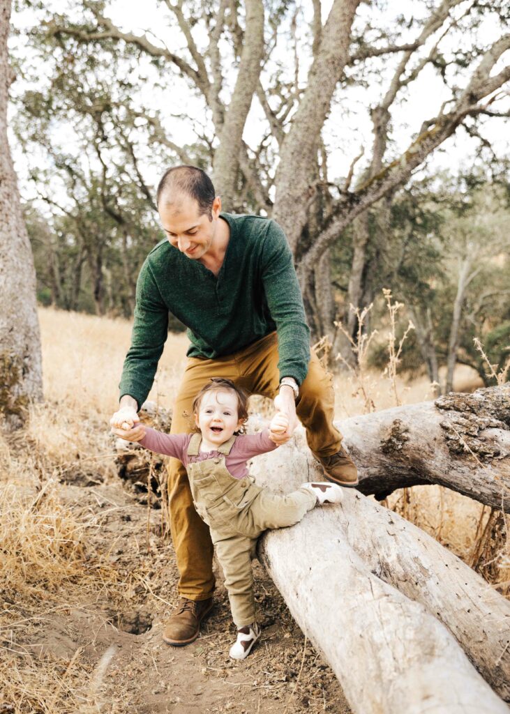 east-bay-family-photographer-IMG_0156-carmen-dunham-photography Father and daughter playing on a tall branch in Walnut Creek