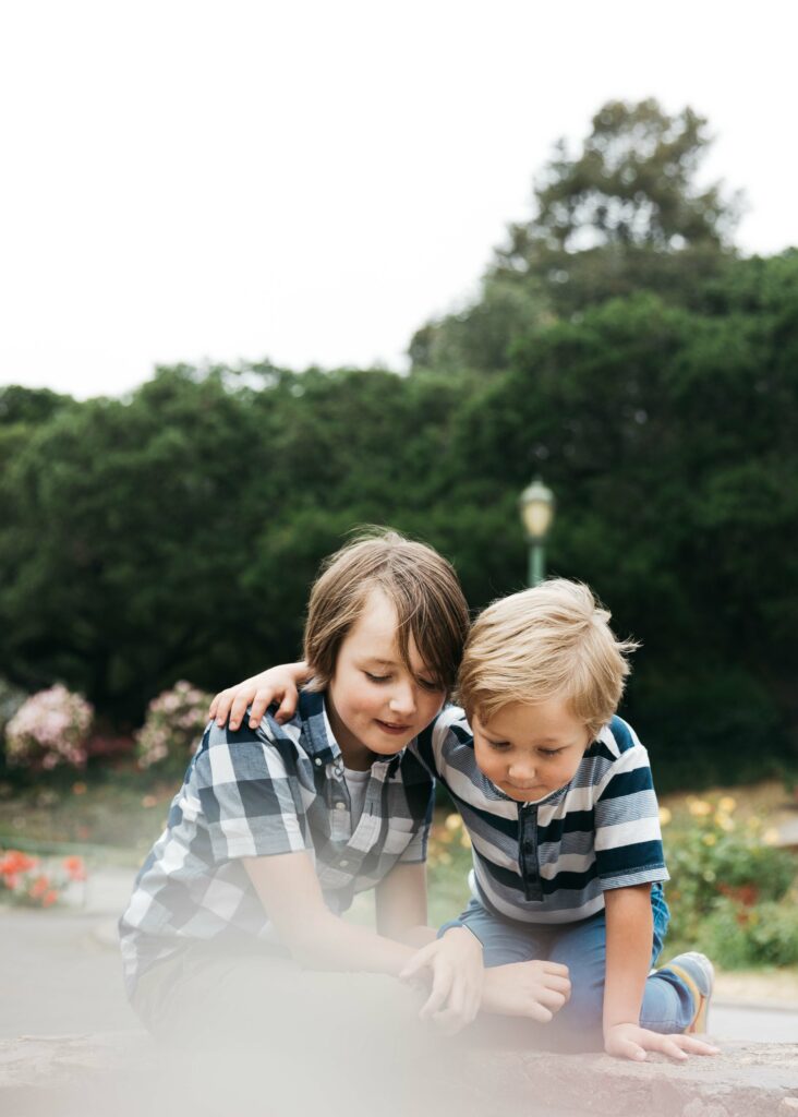 brothers playing at the tier fountain in the Morcom Rose Garden