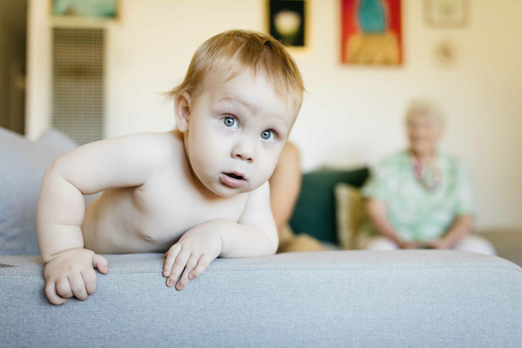 Toddler boy being bashful during a family photo session in sunnyvale, ca