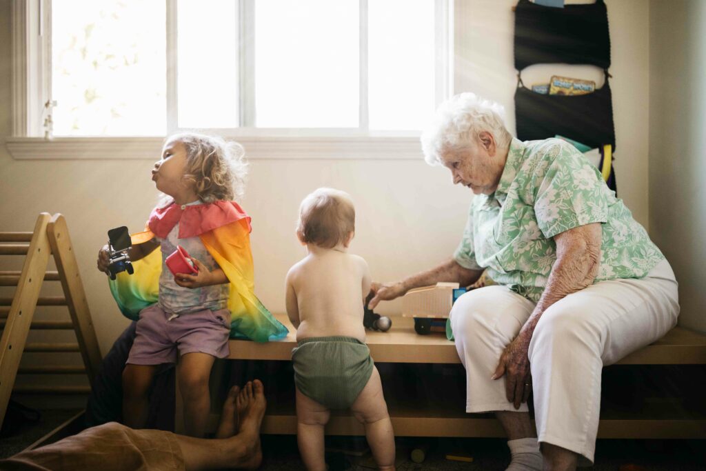 grandma playing with her two grandsons