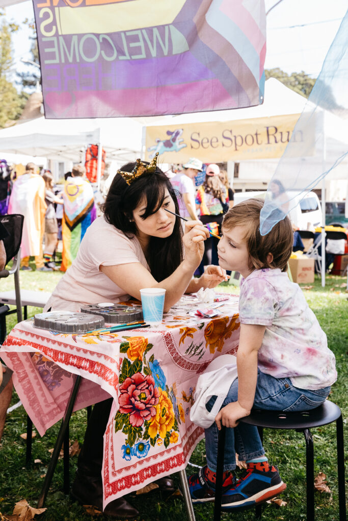 Face paining at Alameda Pride