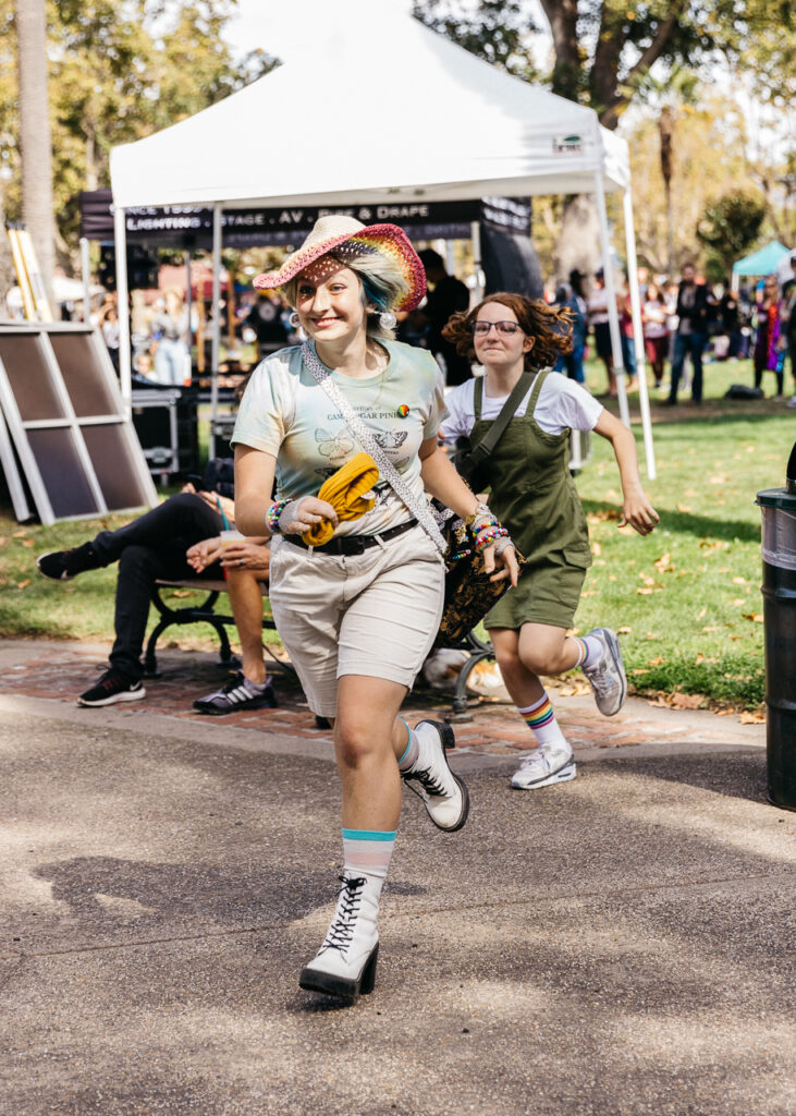 Teens running and having a good time at Alameda Pride 2023