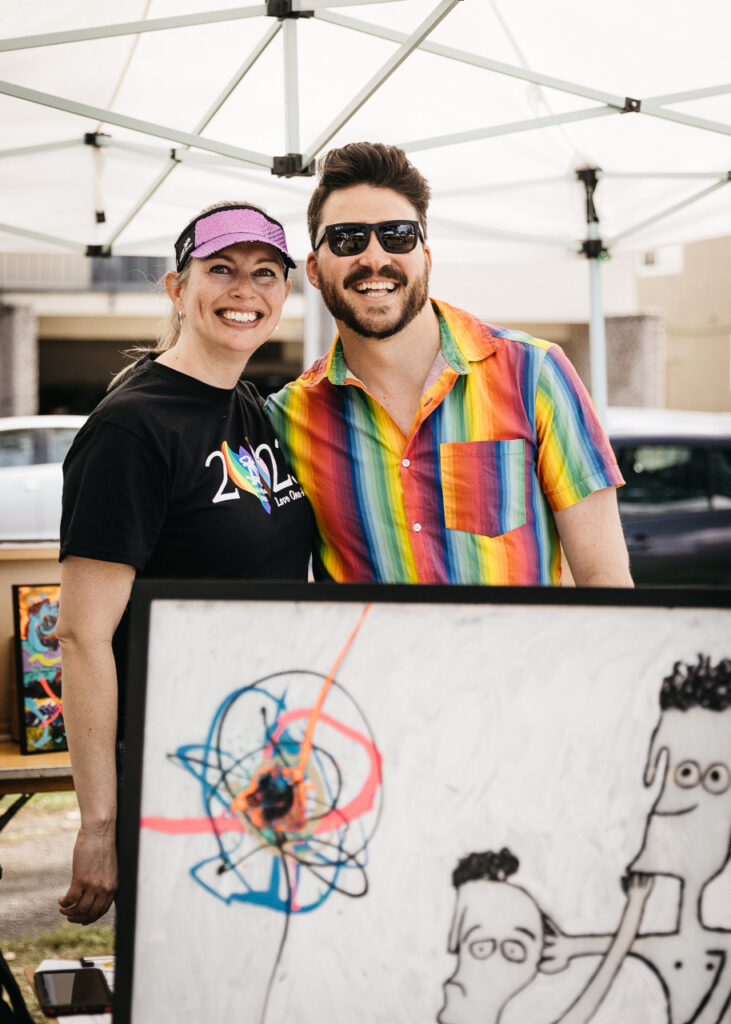Artist selling artwork at Alameda Pride 2023