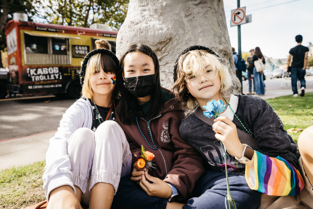 Pre-teens having a picnic at Alameda Pride 2023