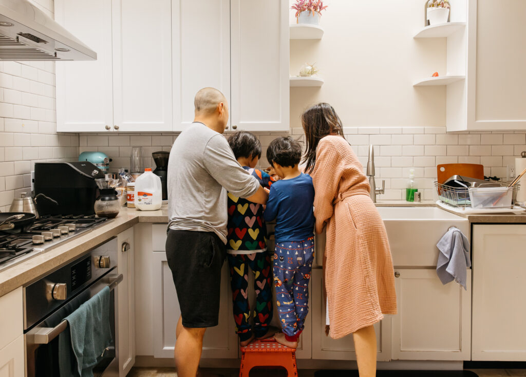 family making breakfast together during a documentary family photo session in san francisco.