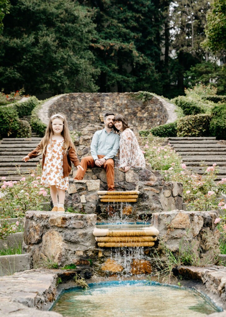 IMG_3786-Oakland-Family-Photographer-Carmen-Dunham-Photography Family playing on the cascading fountain at the Oakland Rose Garden.