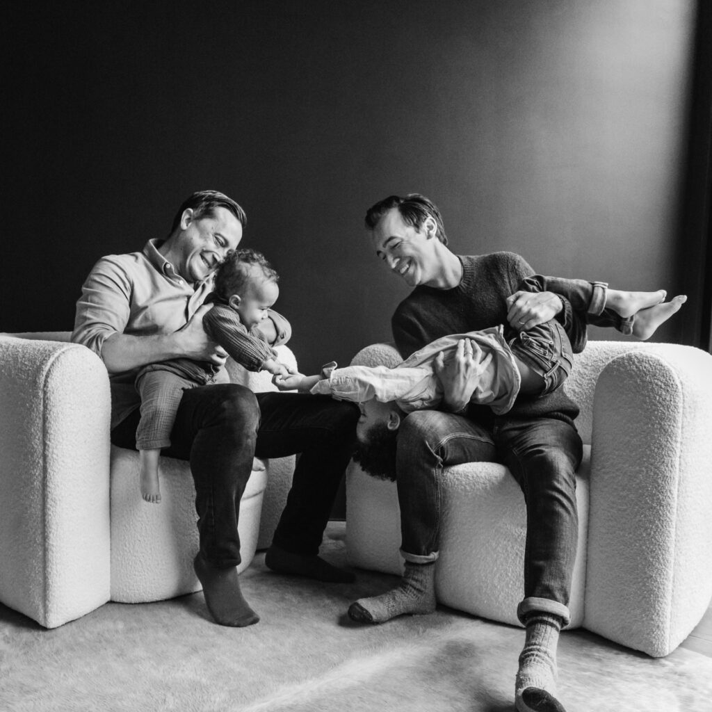 family goofing around in chairs