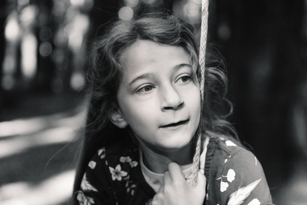 IMG_6471-Oakland-Joaquin-Miller-Family-Photography-Session-Carmen-Dunham-Photography Young girl swinging at Joaquin Miller Park.