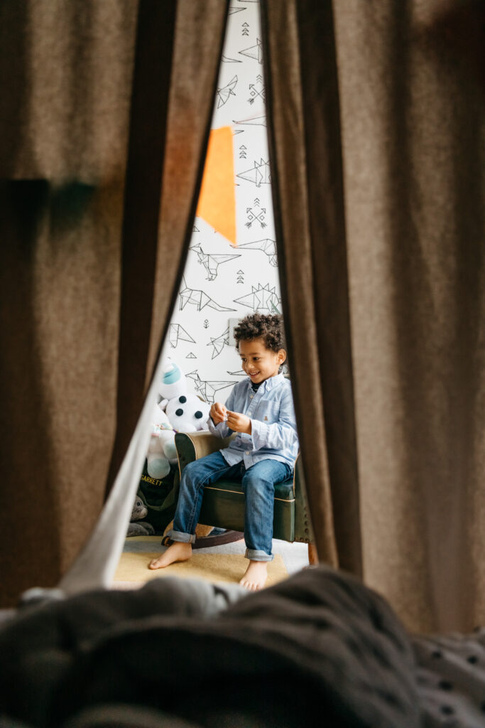 toddler son playing in his room.