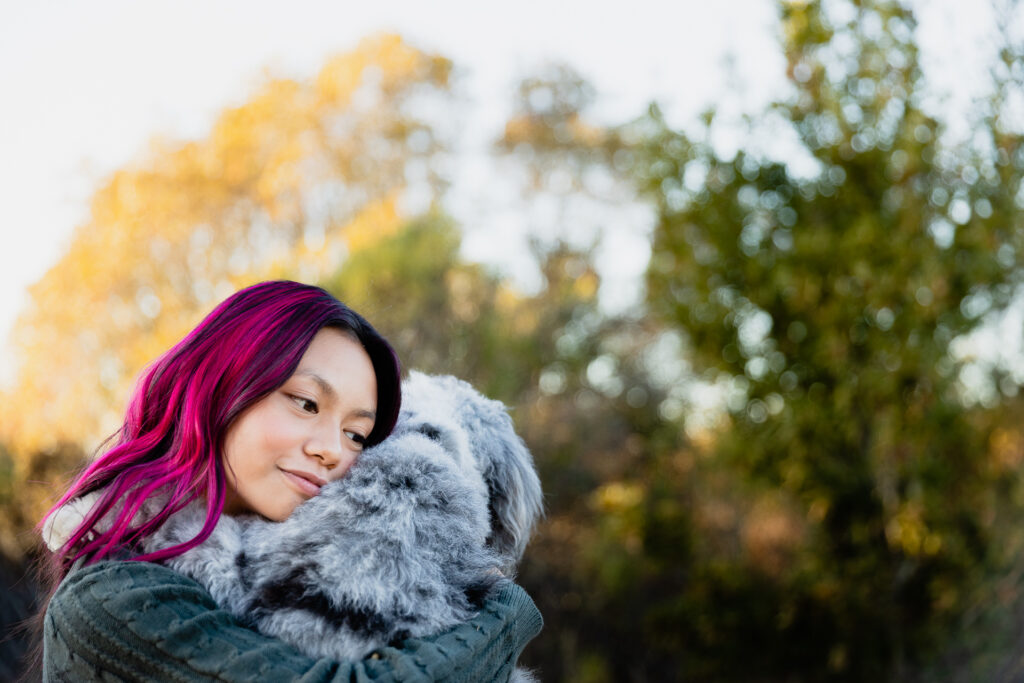 IMG_9386-Lake-Chabot-Castro-Valley-Family-Photographer-Carmen-Dunham-Photography Teenage girl hugging puppy at Lake Chabot.