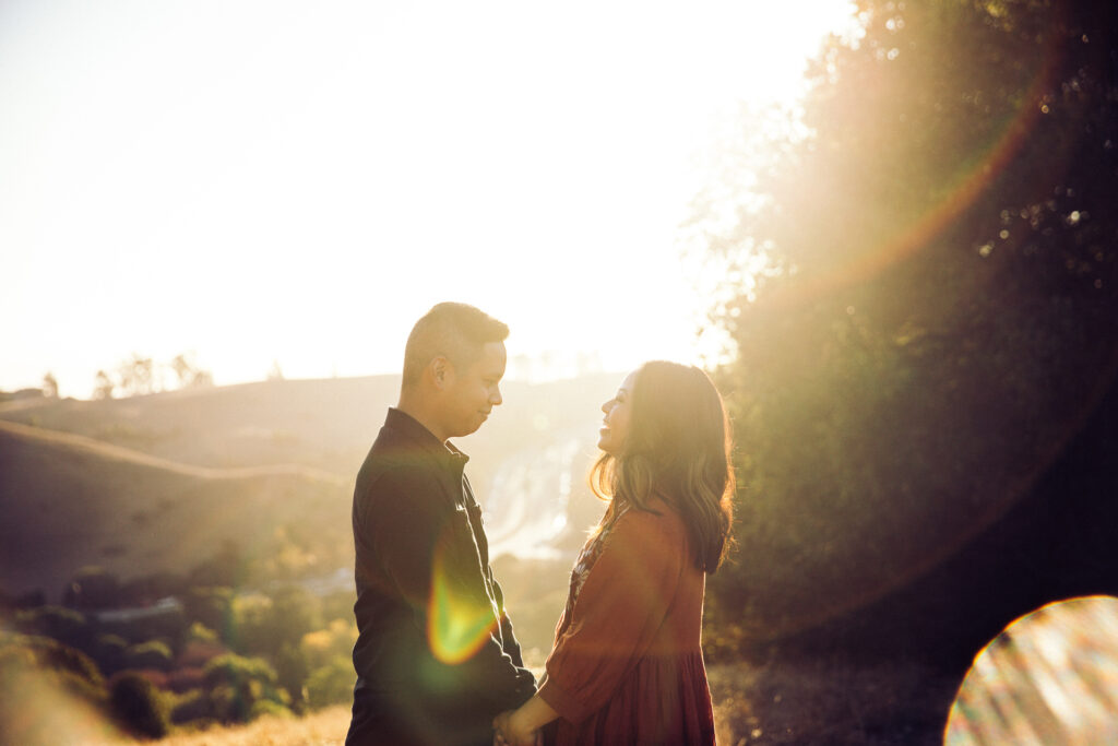 IMG_9445-Lake-Chabot-Castro-Valley-Family-Photographer-Carmen-Dunham-Photography Married couple holding hands at sunset at Lake Chabot.