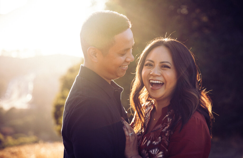 IMG_9457-Lake-Chabot-Castro-Valley-Family-Photographer-Carmen-Dunham-Photography Husband and wife laughing during a family photo session in Castro Valley.