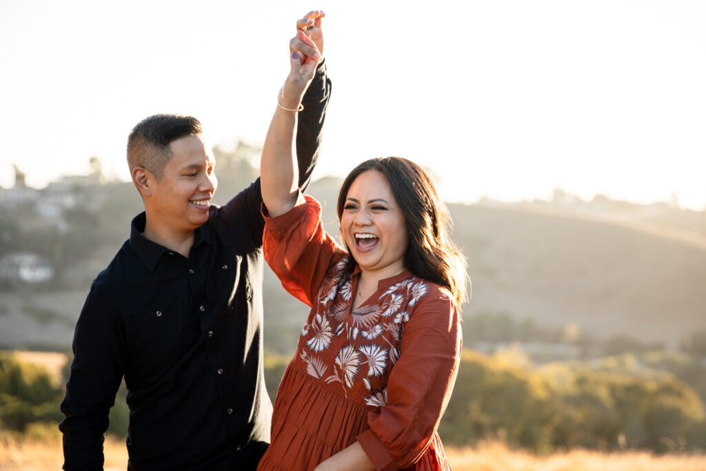 IMG_9500-Lake-Chabot-Castro-Valley-Family-Photographer-Carmen-Dunham-Photography Husband and wife dancing at sunset during a family photo session at Lake Chabot.