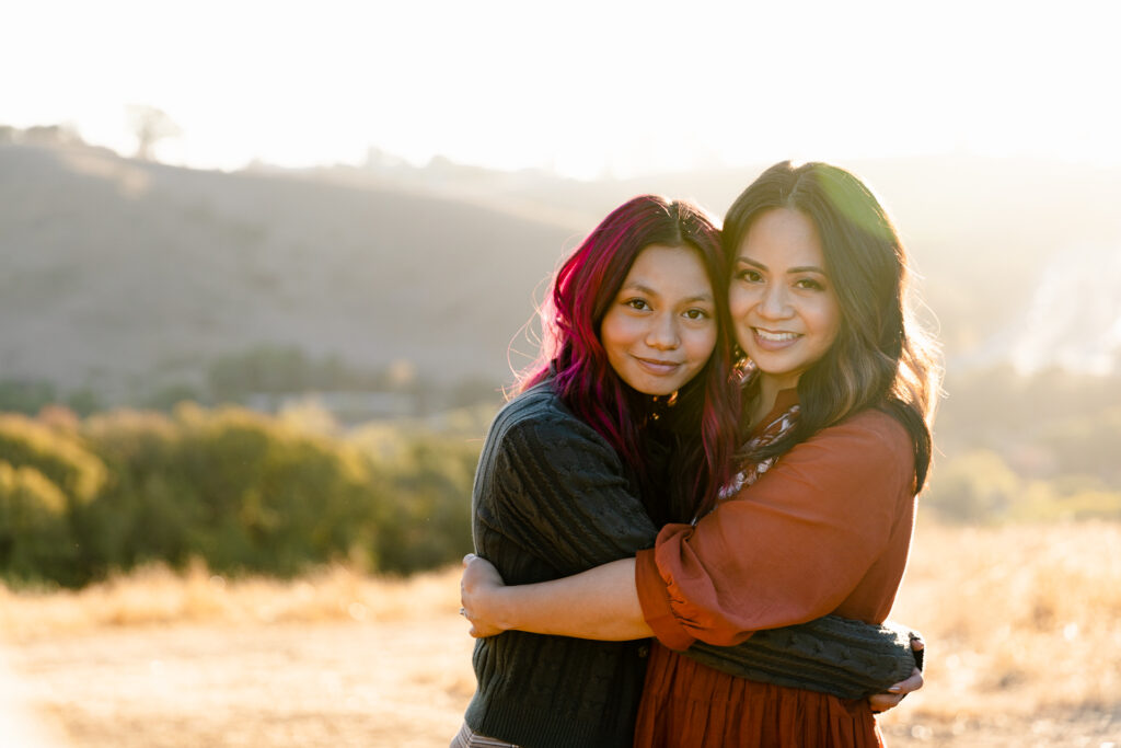 IMG_9543-Lake-Chabot-Castro-Valley-Family-Photographer-Carmen-Dunham-Photography Mother and daughter hugging in the hills of Castro Valley.